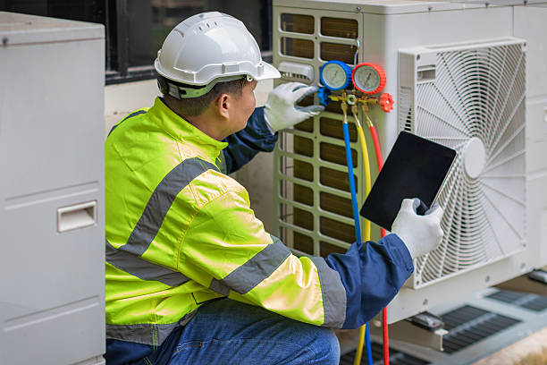 Professional Heat Pump Repair technician working in Waterford, WI